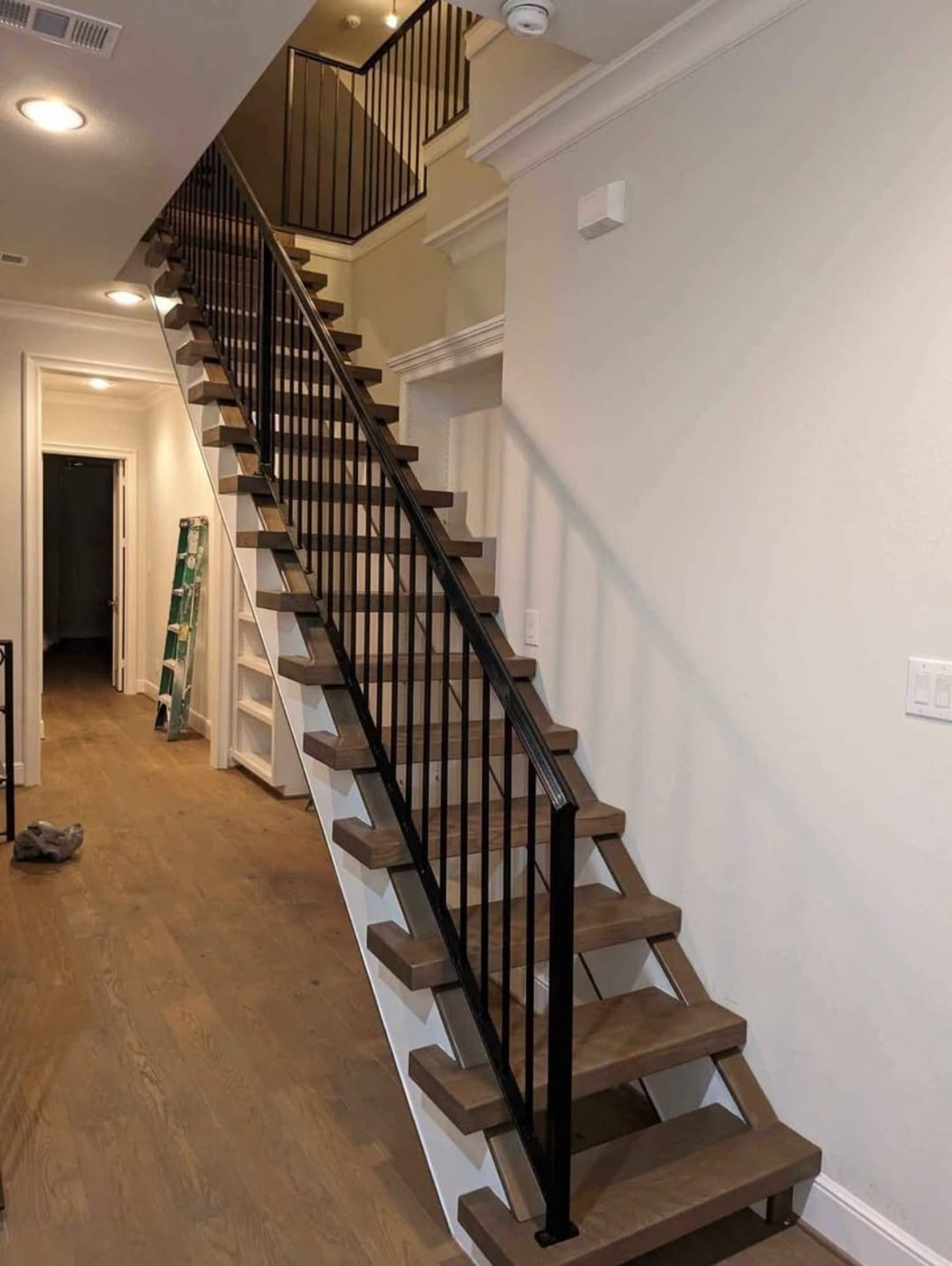 Modern steel stair railing by Affordable Texas Steel, Houston area